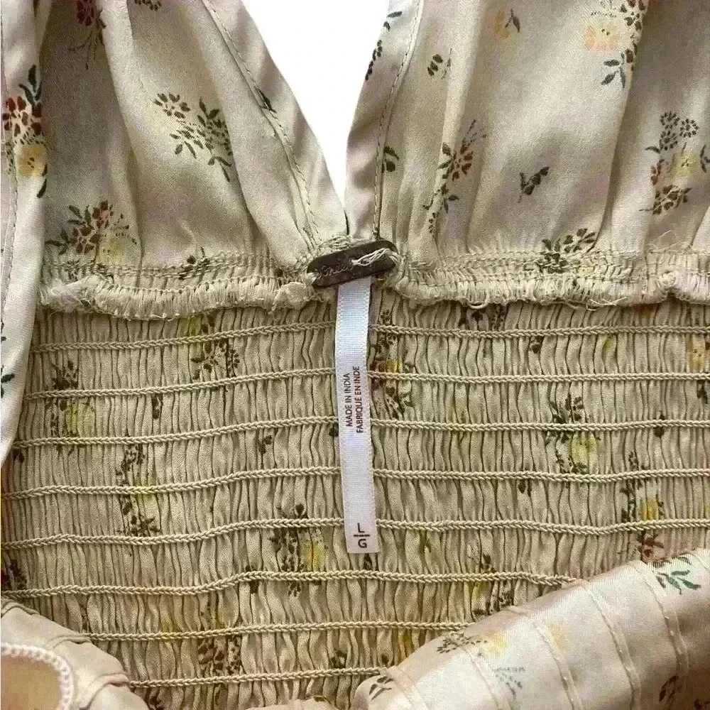 FREE PEOPLE Isabella Silky Floral Ruffle Babydoll Blouse in Copper‎ color